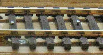 HO track with nails