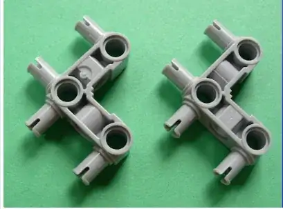 Technic, right angle with 4 pins sticking out
