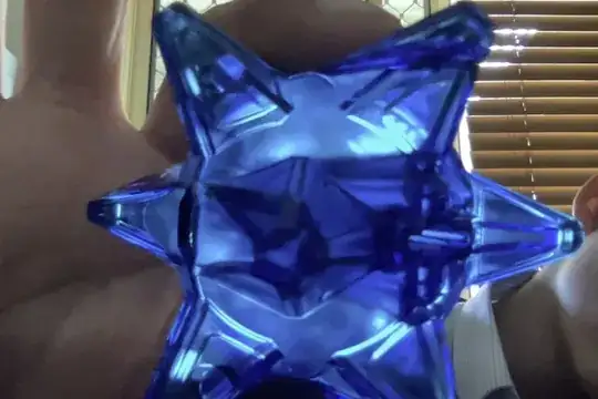 spiky transparent blue with axle hole in the center