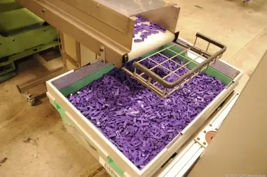 The boxes in those previous pictures are not small. This one's being filled with purple 1x4 curved slopes
