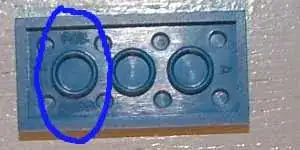 Picture of plain brick with “patent pending” obscured