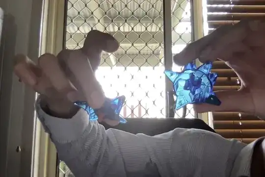 spiky transparent blue with axle hole in the center