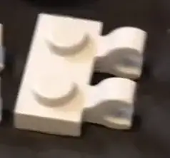 two studs long and has the clips on one side