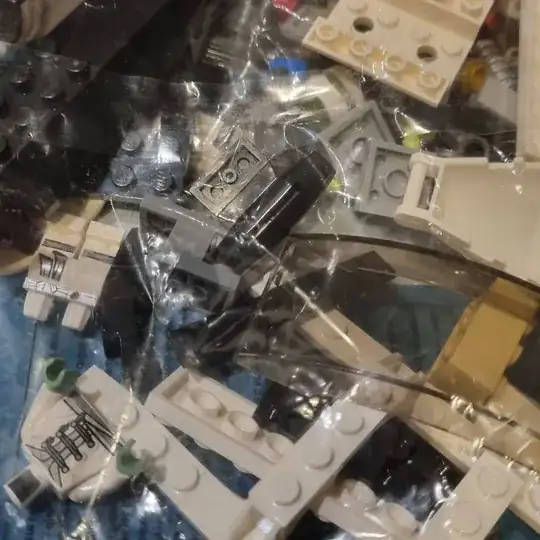 white Lego pieces with a distinctive minifig