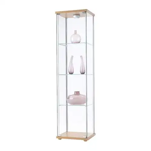 IKEA DETOLF glass cabinet with generic trinkets on the shelves