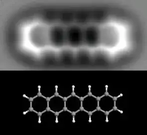 from http://cdn.phys.org/newman/gfx/news/hires/2009/ibmpentacene.jpg