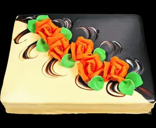 square cake with chocolate icing