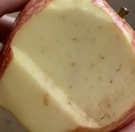 Gala Apple with thin brown lines in the flesh.