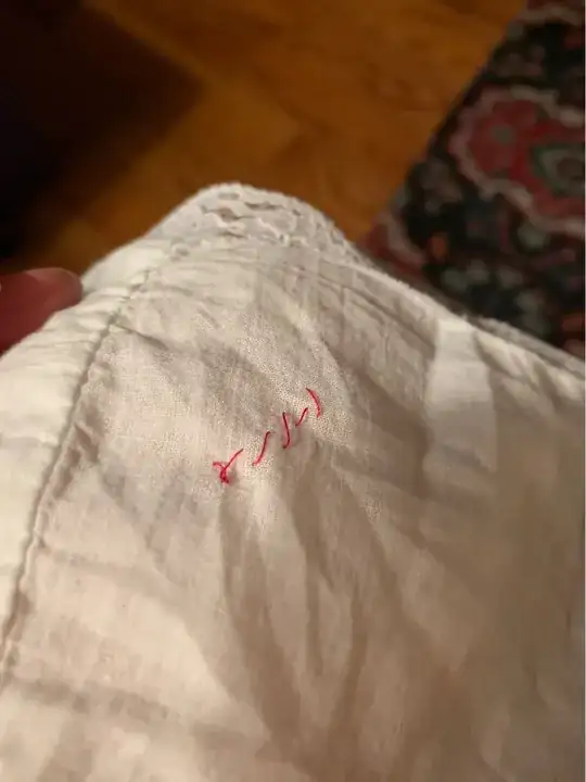 sink the extra thread into the material 