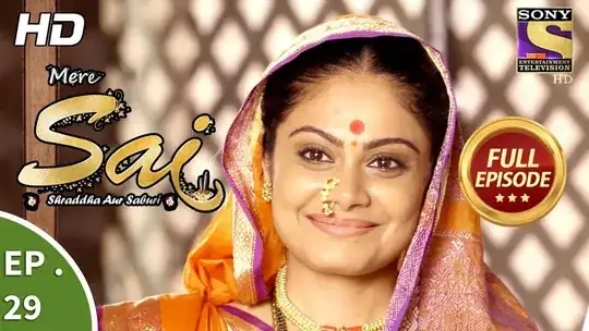 the same lady, smiling