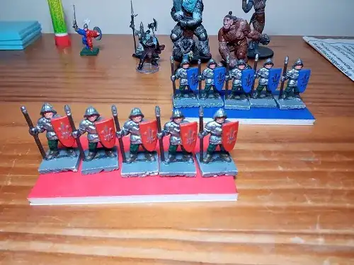 Trays with miniatures figures on top