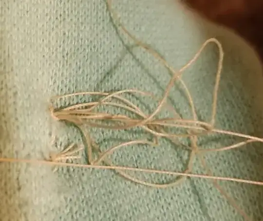 an image of the loose cloth coming out of the back of the sewn-cloth. 