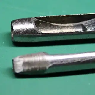 leather punches, side-on