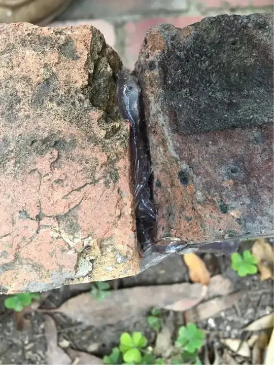 Two house bricks glued together with Selley’s Liquid Nails Clear.