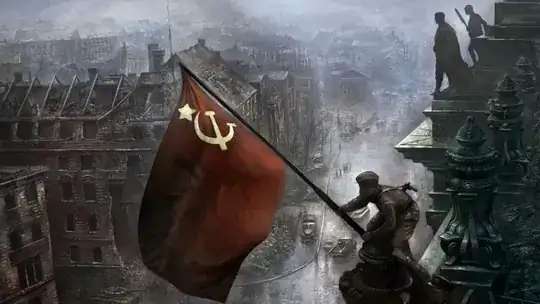 Raising a flag over the Reichstag Berlin 1945