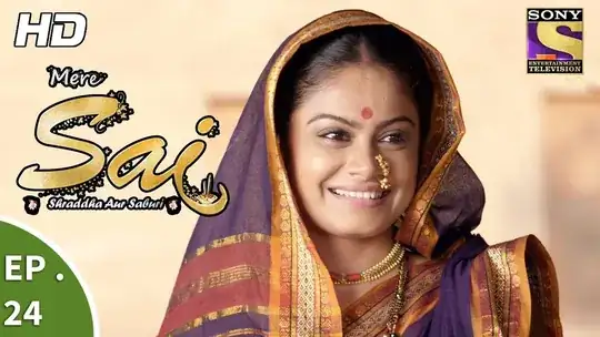 the same lady, smiling