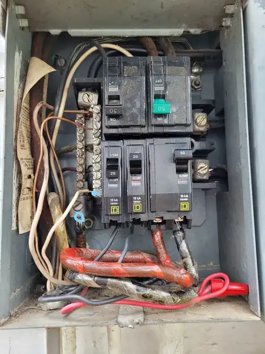 panel with the dead front removed & trouble spots highlighted