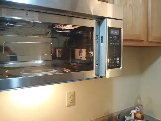 Sandpaper-like component inside microwave