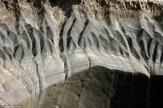 vertical walls cut by plasma, saw tooth edge results from hypersonic blast