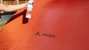 Then evenly spray the damp areas with your waterproofing spray.