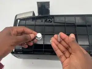 Filter Basket Door Release Button