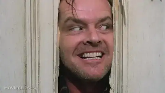 Picture of a man smiling like a horror movie actor (crazy smile)