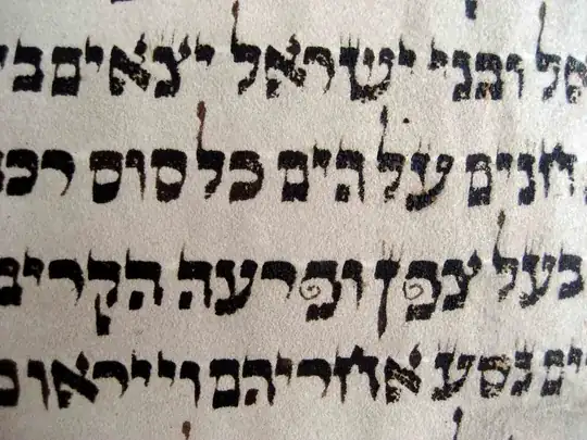 A photocopy of parts of Exodus chapter 14, verses 8 through 10. In it, the letter "fei" in each of the consecutive words "tz'fon u-far'o" has its left-side dangling part very thin and curled up in an inward spiral.
