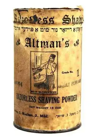 Yellowed label of a can with English and Hebrew/Yiddish words on it, including "Altman's RAZORLESS SHAVING POWDER", and am image of a man at a bathroom sink