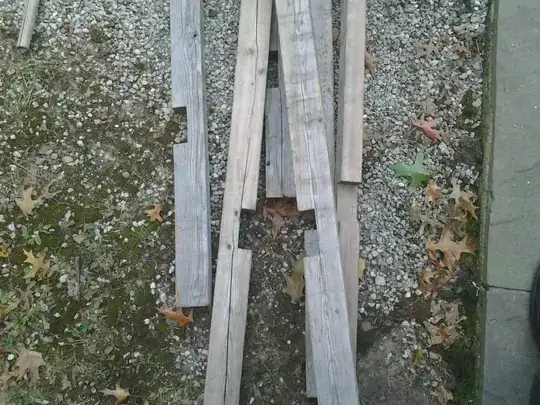 2x4s, each with a notch that removes a few inches along the length of the board from half of its cross-section