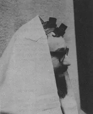 Sephardi wearing two pairs of tefillin