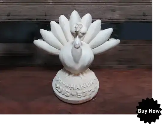 Hanukah menorah in the form of a turkey sculpture, with the candle-holders arrayed in an arc behind the tips of the turkey's feathers.
