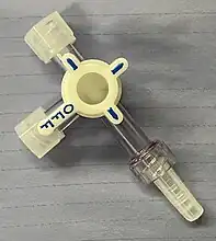 A three way stopcock, a little stiff to turn, but can be turned to all ports open