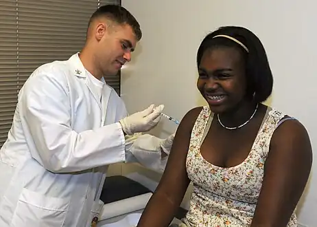 A tetanus vaccine is being administered at the Naval medical Center San Diego