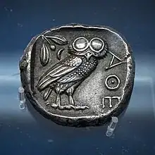 (photo of another instance of the Athenian tetradrachm, displaying owl)