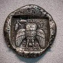 (photo of Athenian dekadrachm, displaying owl)