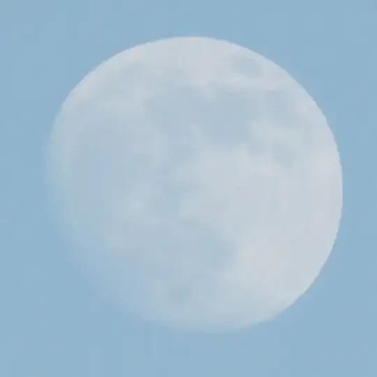 picture of the moon during daytime