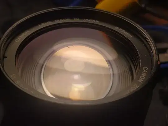 photo of lens with small scuff on the front element
