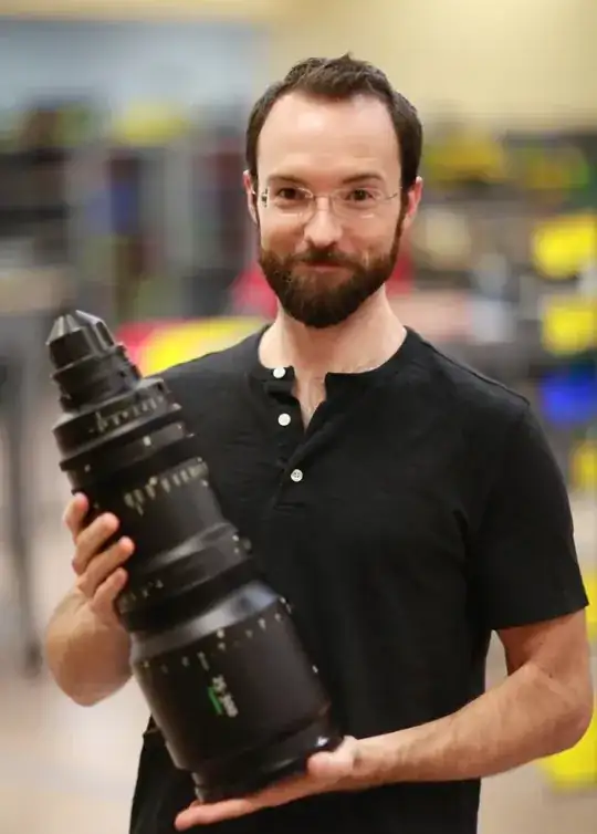 Holding the 25-300mm f2.8, from lens rentals blog