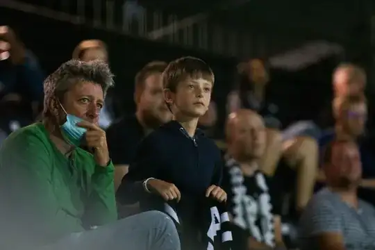 Fans at soccer match during coronavirus