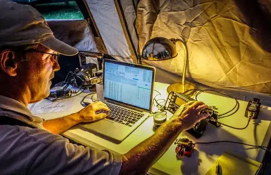 Gary, N3GO, operating 80m straight through the night without leaving the oh-so-comfortable lawn chair