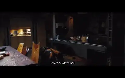 Jayne scrambles on hands and knees through the main room as the caption reads "glass shattering."  He jumps up and stumbles into a room where Kaylee and Inara are in seats, throwing a table out of the way as he goes.  The caption reads "Explosions."  He goes to Kaylee and Inara in turn calling "Check" for each of them.  The scene cuts to Serenity freefalling out of the sky with the caption "Engine whining."