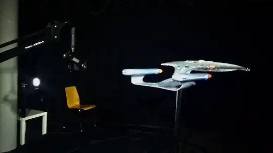 Back stage footage of a prop of the Enterprise model held up by a pole