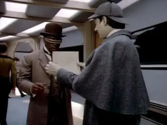 Data, right with his back to the viewer, is dressed in a Holmesian grey deerstalker cap and cape and holding a piece of paper between his hands, showing it to LaForge, facing him on the left, dressed in a brown suit with a long jacket over a waistcoat and a brown bowler hat. Several other crew can be seen walking in the background of the Enterprise corridor.