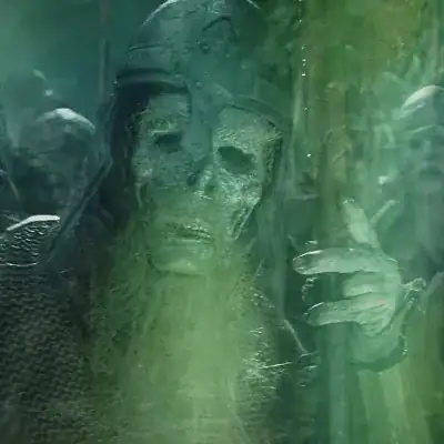 A member of the Army of the Dead, clad in chainmail and a metal helmet, his mummified face and straggly remnants of a red beard clearly visible