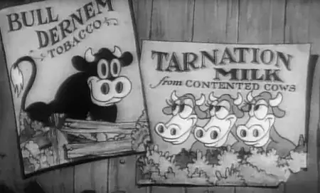 Two signs. One says "Bull Dernem Tobacco" with a picture of a bull behind a wooden fence, and the other says "Tarnation milk from contented cows" with a picture of three cows.