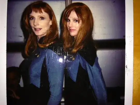 the two actresses side-by-side, both have red hair and a blue uniform; they look very much alike