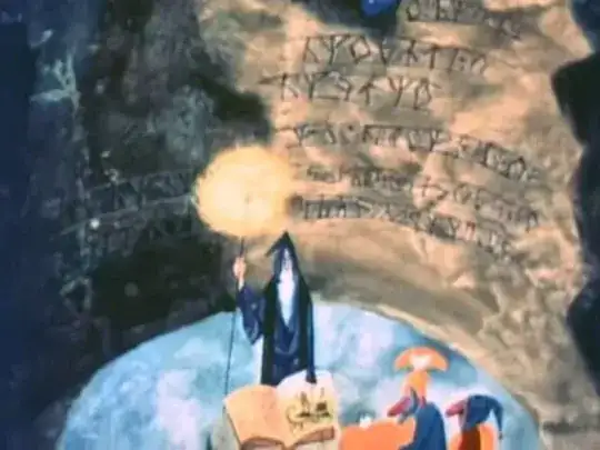 The interior of the tower seems to be a single space; all we see is a curved wall with lines of glyphs carved into it, a blue floor and Gandalf, his staff giving illumination, standing at a table with an open book.  Two other figures, partially visible, stand facing Gandalf.