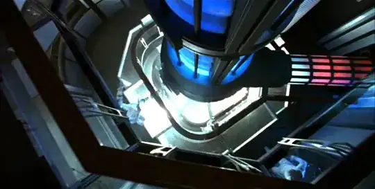 Screen grab from Star Trek VI: The Undiscovered Country of the upper level of engineering section, looking down. The vertical intermix chamber is metallic grey with glowing blue sections. Some type of glowing conduit juts out from the side of the chamber. The conduit is glowing white to pink and red with a metallic grille wrapped around it.