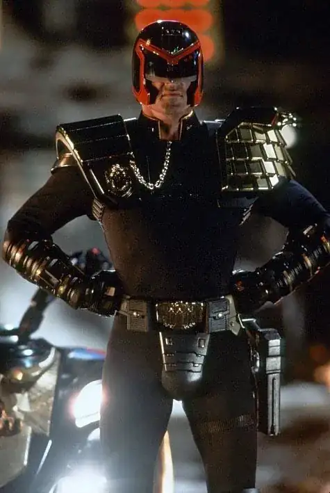 Judge Dredd in not much more than a leotard, codpiece and pauldrons.