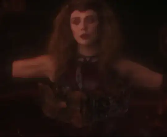 Wanda Maximoff (Scarlet Witch) reading a book in the post-credits scene of the final episode of WandaVision
